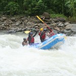 Plowing through rapid on the Savegre River